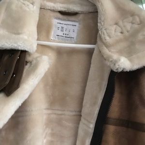 Urban outfitter , brown coat with cream fur